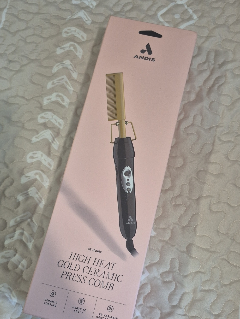 Andis Gold Ceramic Press Comb with Pink Packaging and Black Handle